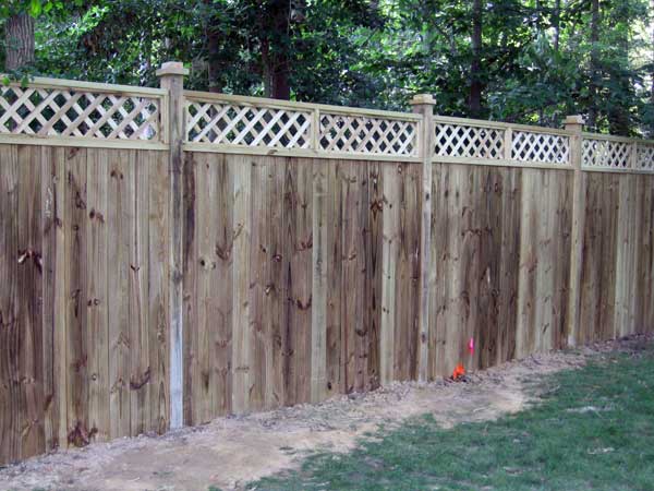 wood privacy fence in lattice style