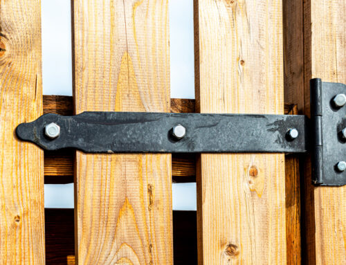 Why Do Some Wood Fences Use Galvanized Steel Posts?